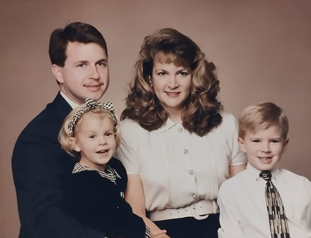 Samuel Price as a boy in a shirt and tie with his father, his mother and his sister, from a family portrait